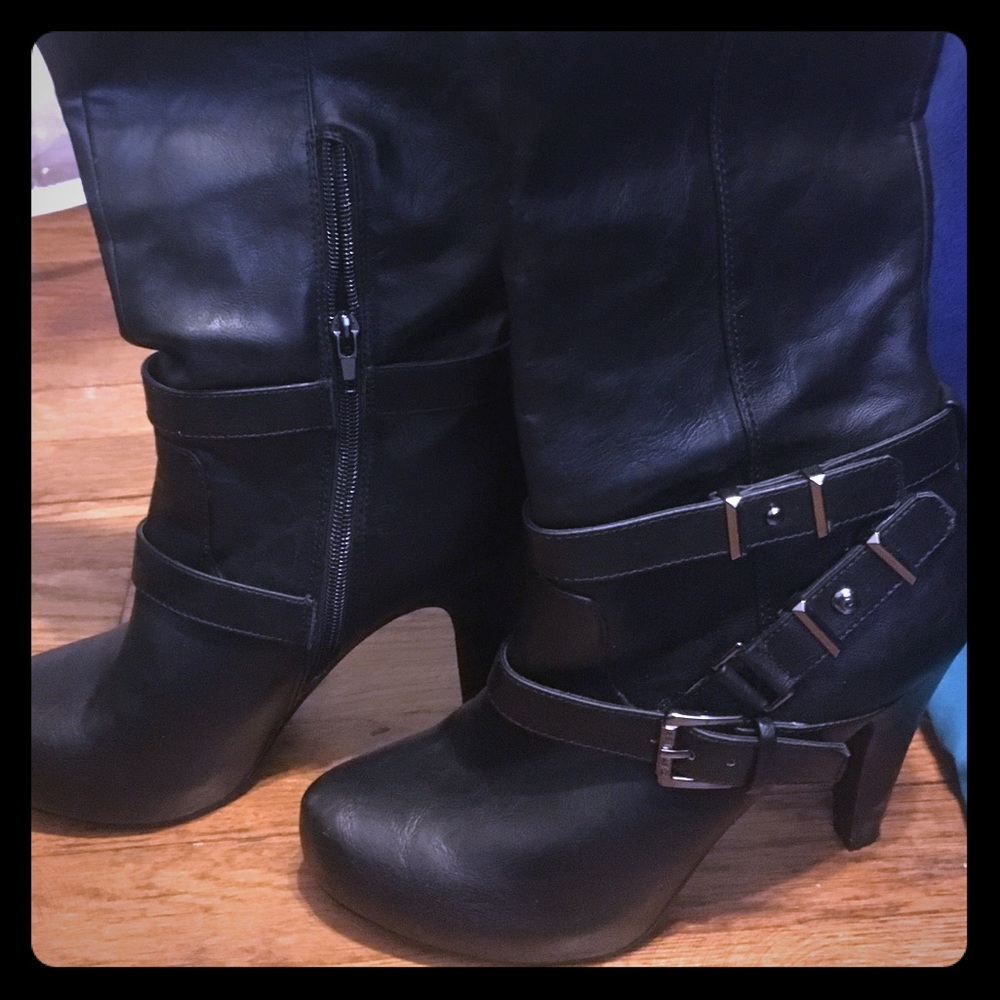 Knee high heeled boots